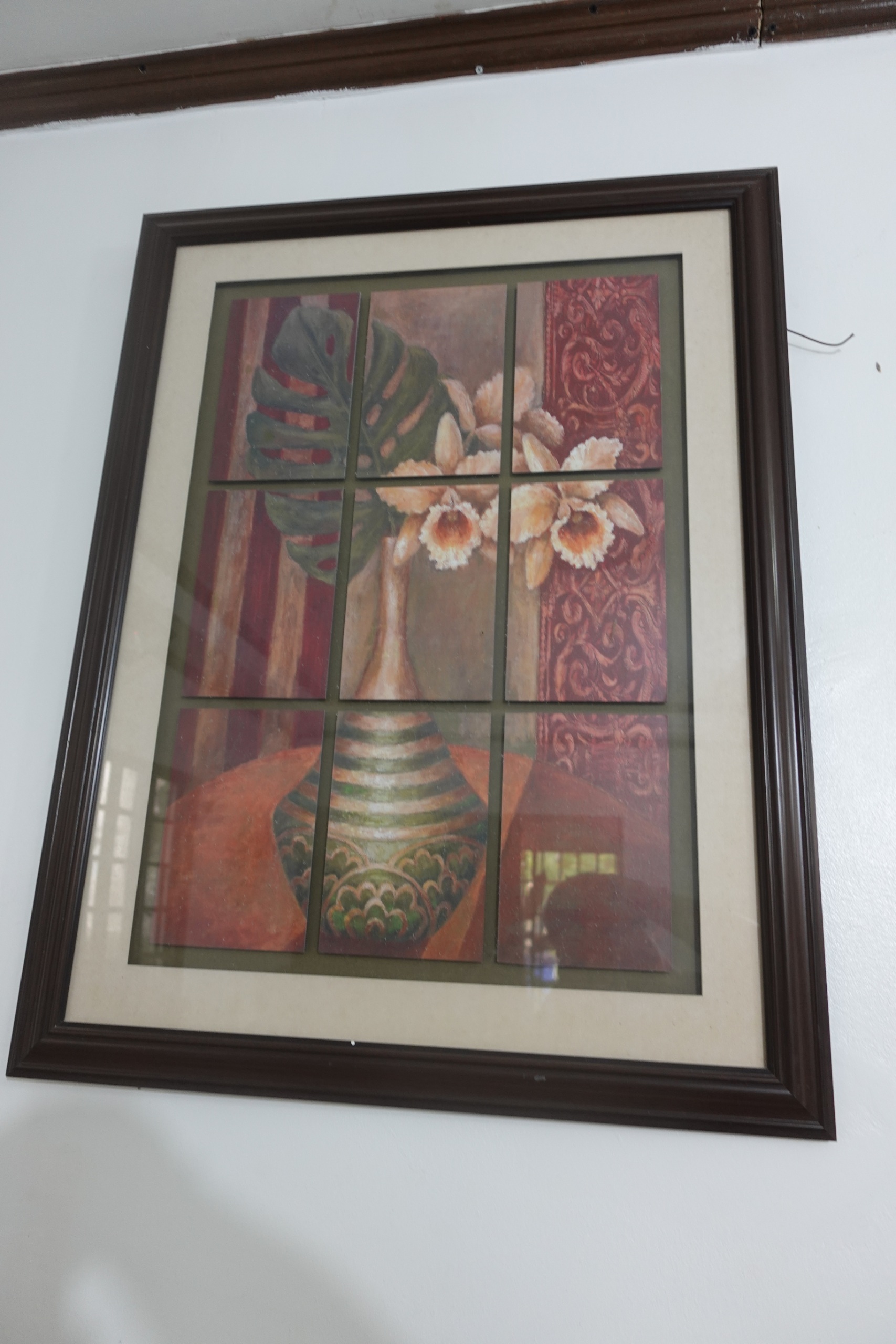 Framed floral wall art with grid panels