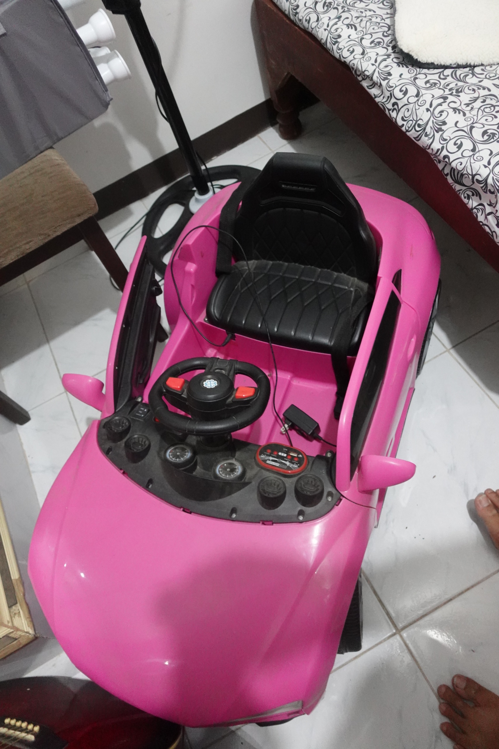 Pink electric ride on car for kids with charger
