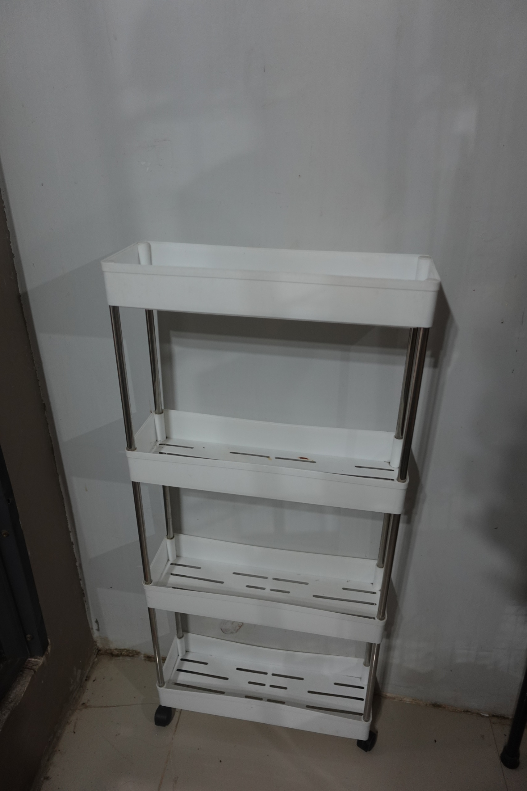 White 5 tier slim storage rack on wheels