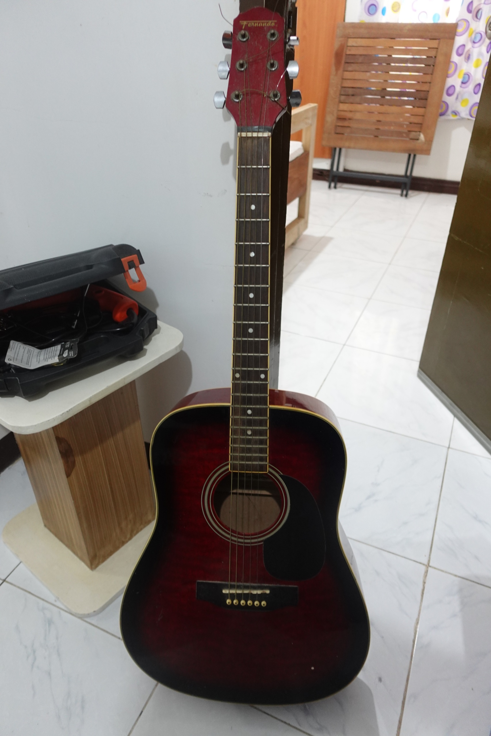 Red sunburst acoustic guitar dreadnought