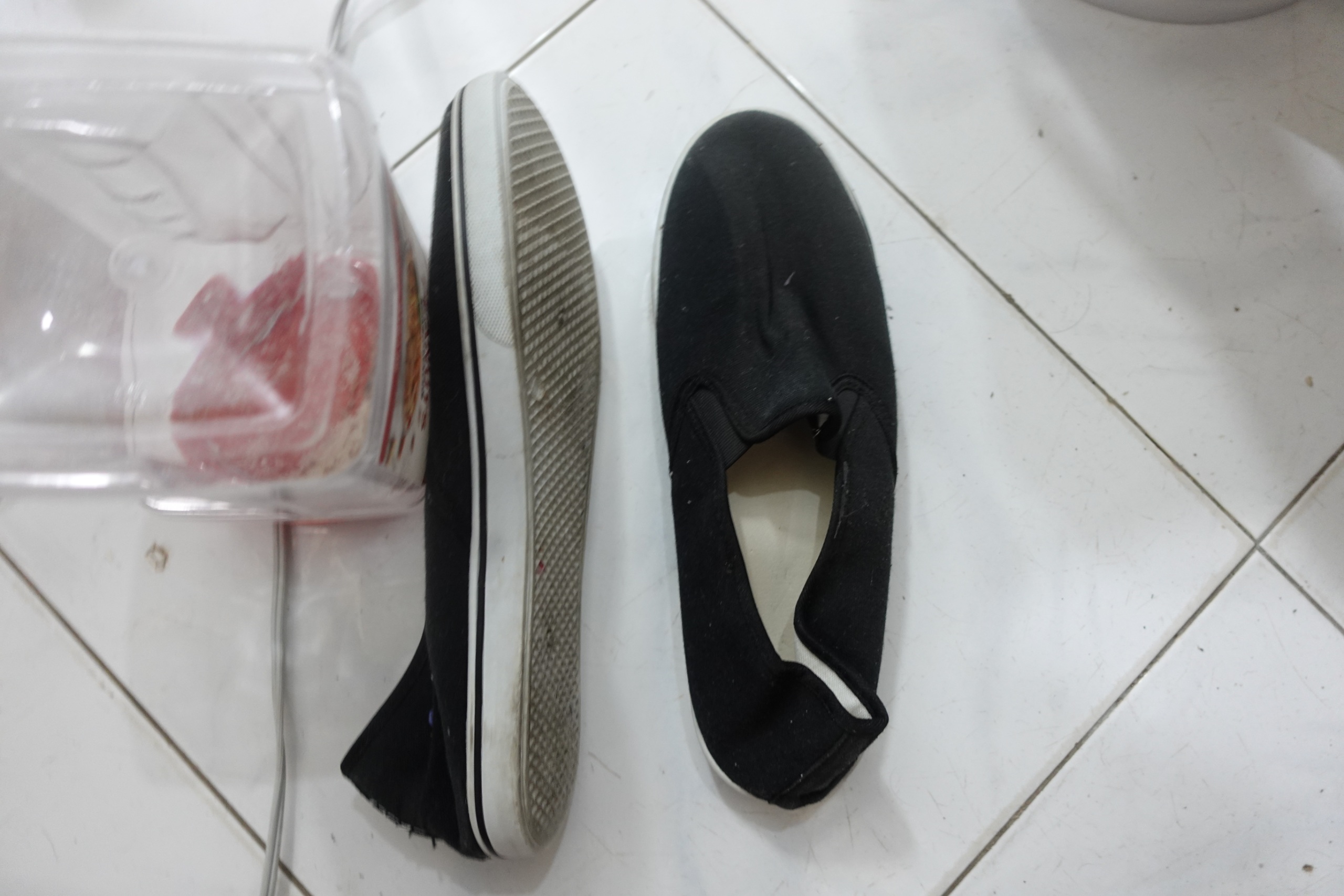 Black Canvas Slip On Shoes Pair